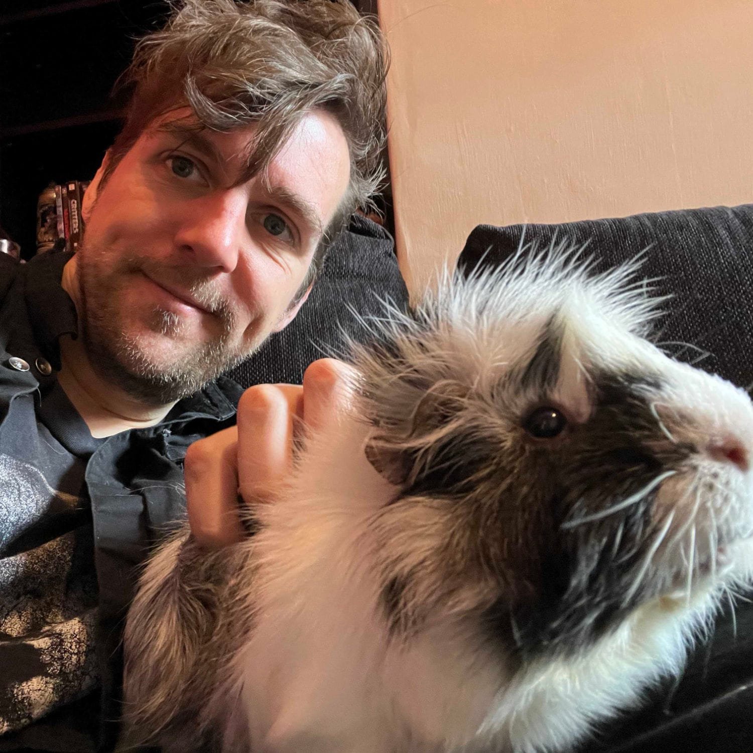 Alan the Lancashire wedding videographer Lancashire wedding videographer holds a guinea pig